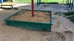 Новый песок в песочницы